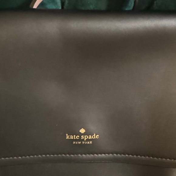 kate spade black leather flap backpack with pink trim